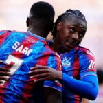 Eberechi Eze and Ismaila Sarr celebrate a Crystal Palace goal