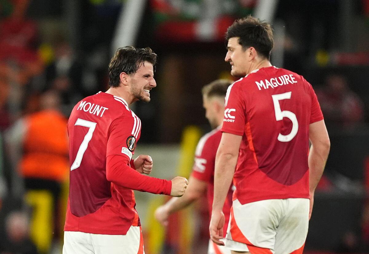 Mason Mount and Harry Maguire of Manchester United