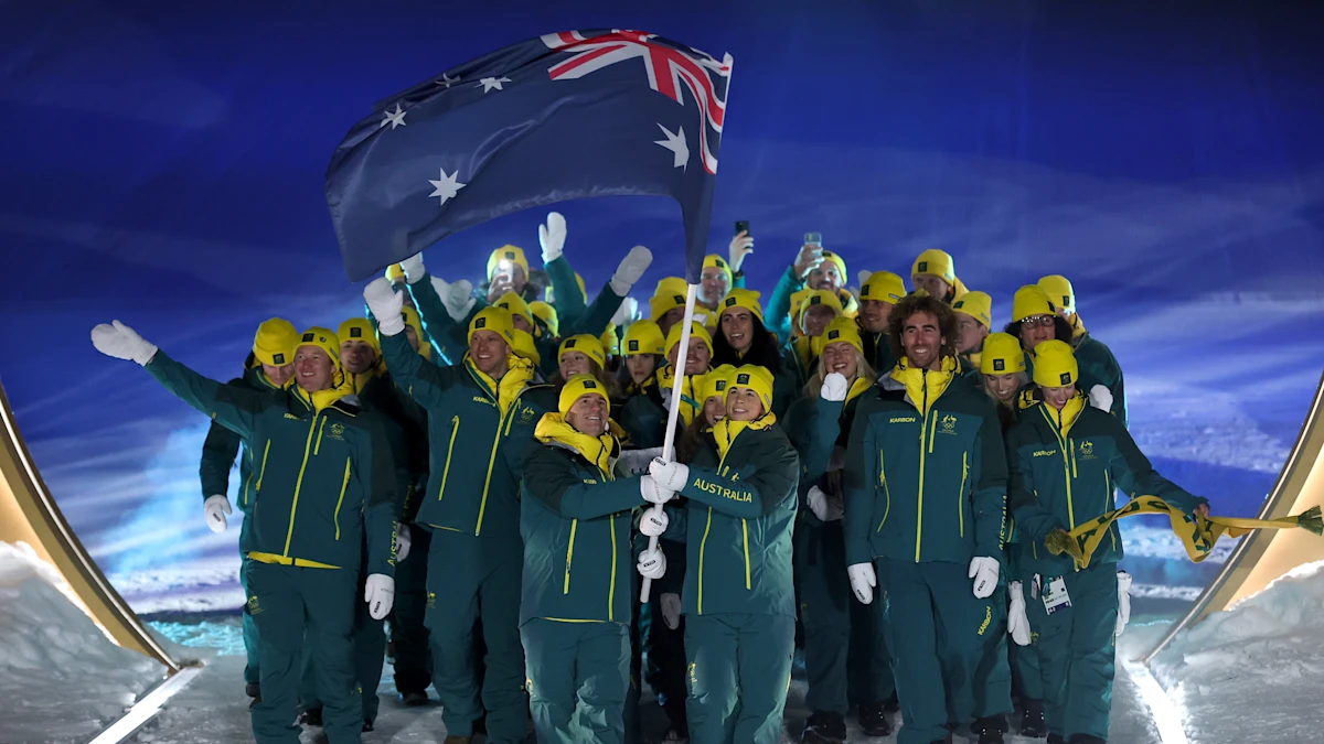 Cerimônia de Abertura; Últimas manchetes; Anthony e Graham lideram o ataque enquanto o Team Australia marcha, a música icônica escolhida por Mariah Carey para uma performance impressionante