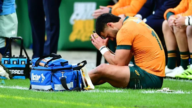 Tom Wright, da Austrália, está ferido.