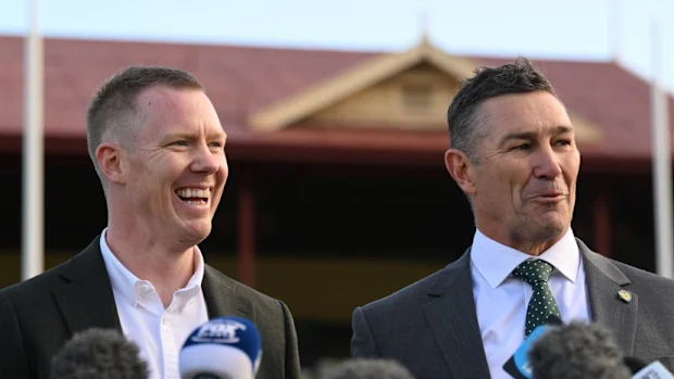 Jack Riewoldt e Alastair Lynch na Tasmânia.
