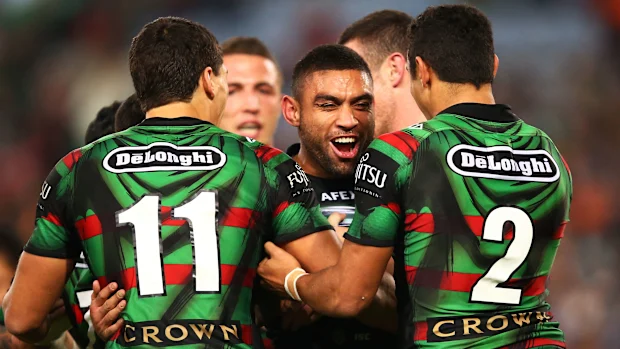 Nathan Merritt comemora um try durante a partida da 14ª rodada da NRL entre South Sydney Rabbitohs e Wests Tigers no ANZ Stadium em 13 de junho de 2014 em Sydney, Austrália.