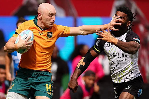 James Turner, da Austrália, afasta George Bose, de Fiji.