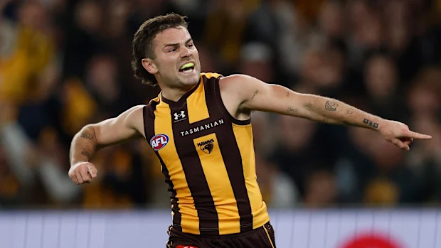 Nick Watson comemora um gol.