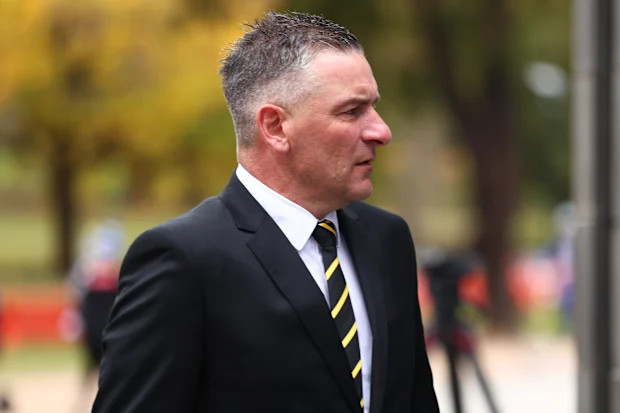 O técnico do Richmond e ex-jogador do Melbourne, Adem Yze, no funeral de Neale Daniher. 