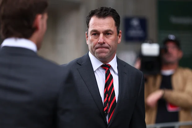 O técnico interino do Essendon, Dean Solomon, no funeral de Neale Daniher. 